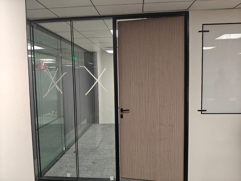 Glass Partition with Veneer Door — commercial office fit-out by MS Interior, Hyderabad